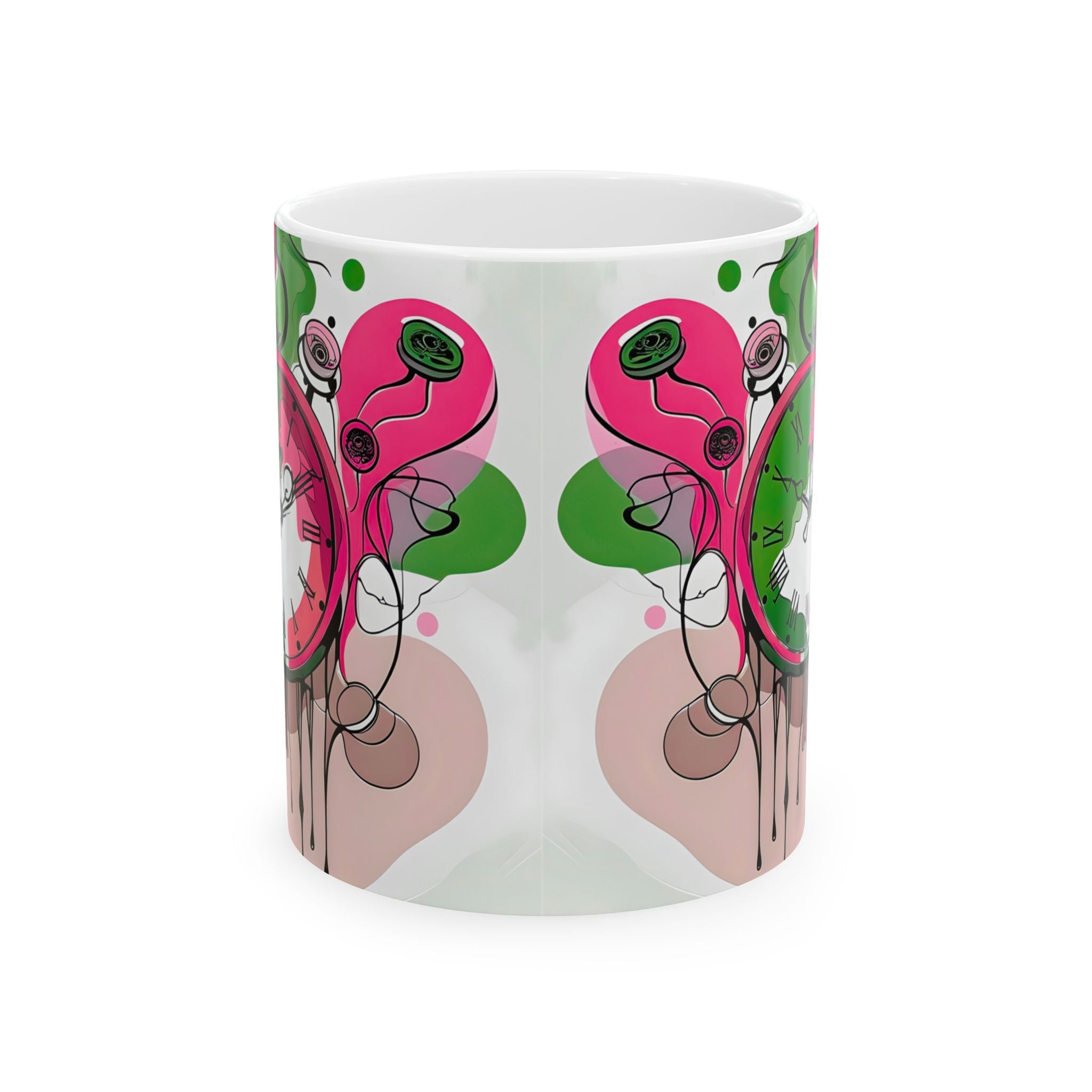 Mug with pink and green abstract designs on a white background