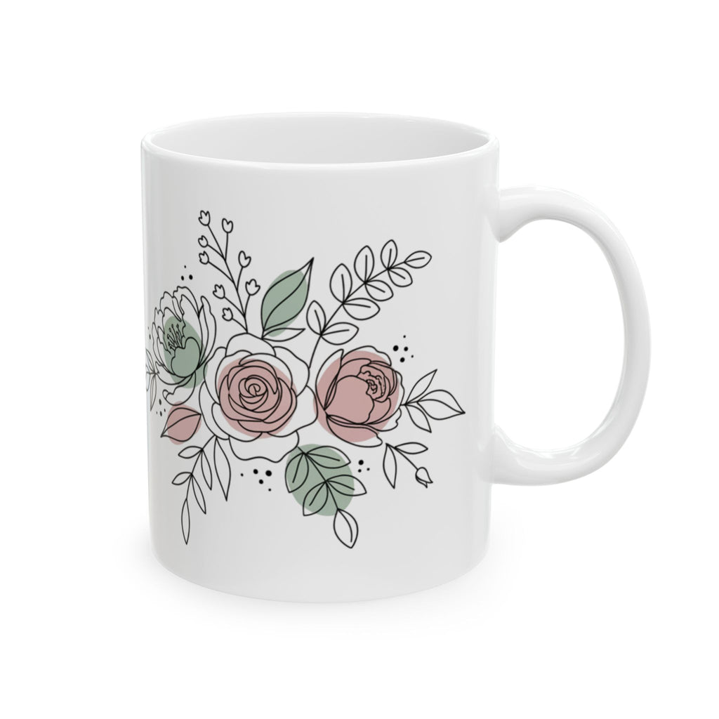 White mug with floral design on a white background