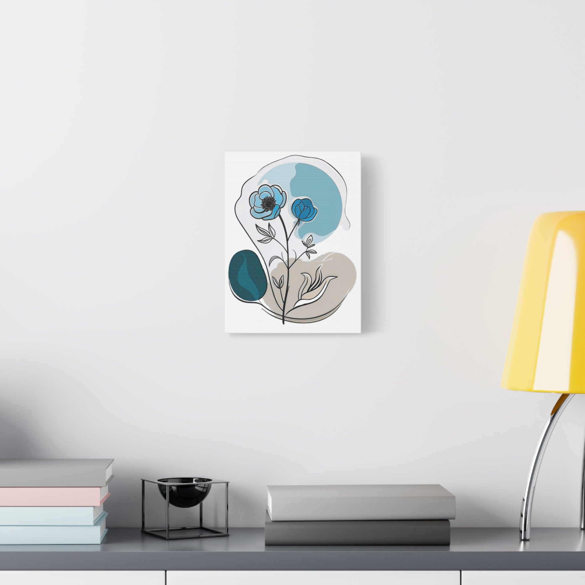 Decorative wall art with floral design on a white wall above a shelf.
