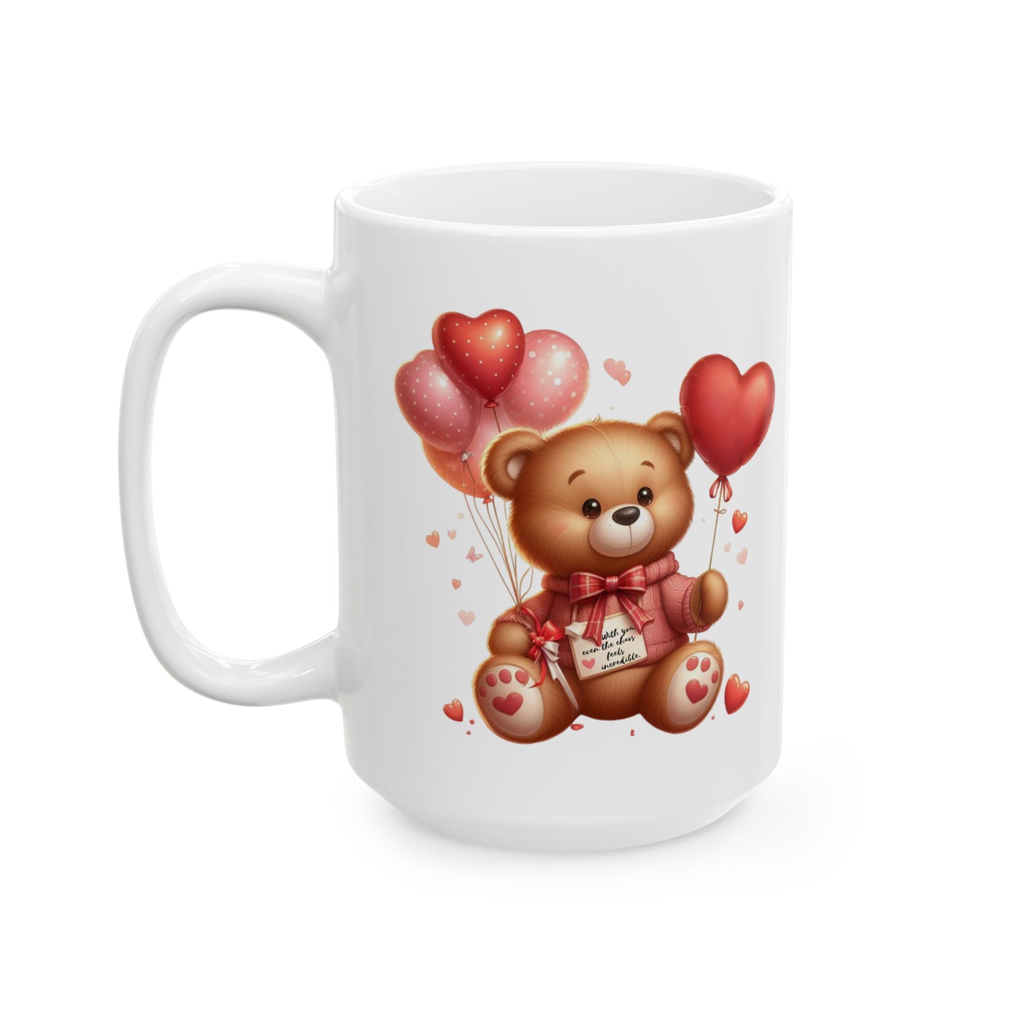 White mug with a teddy bear holding heart-shaped balloons on a white background