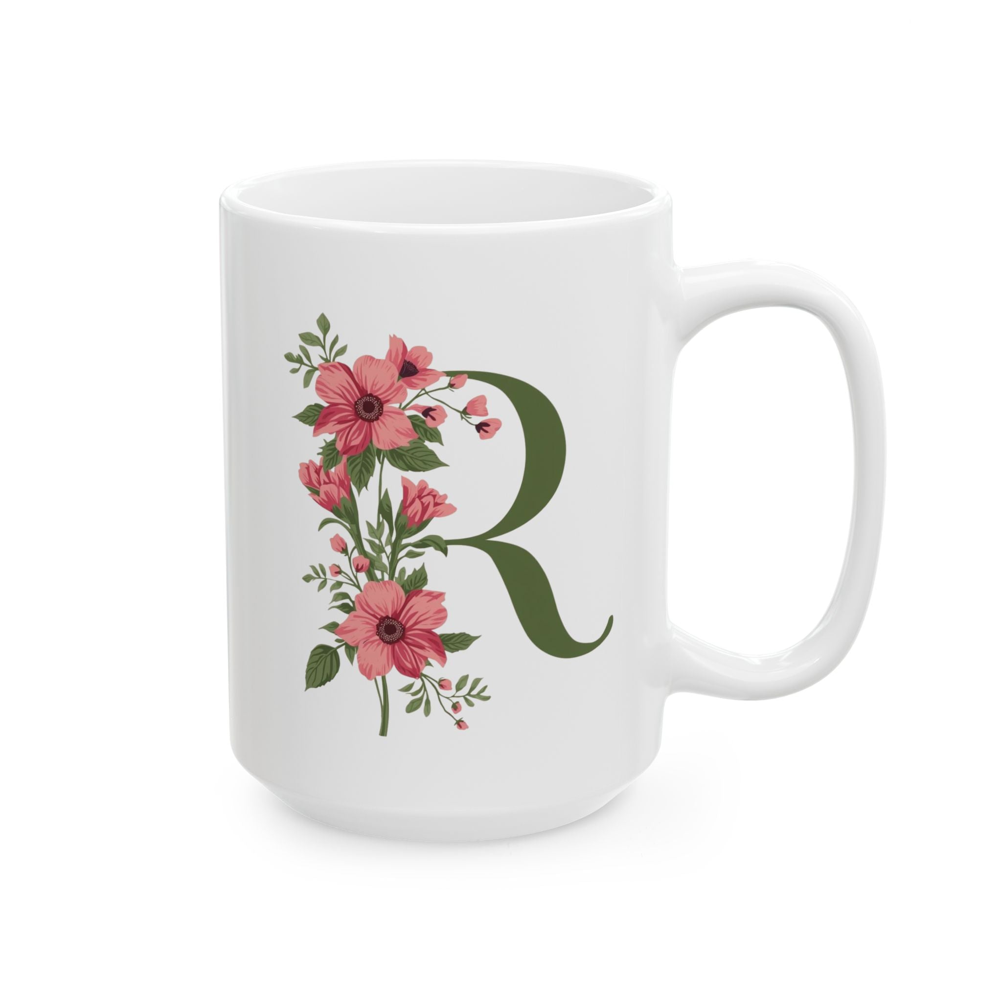 White mug with floral design and letter 'R' on a white background