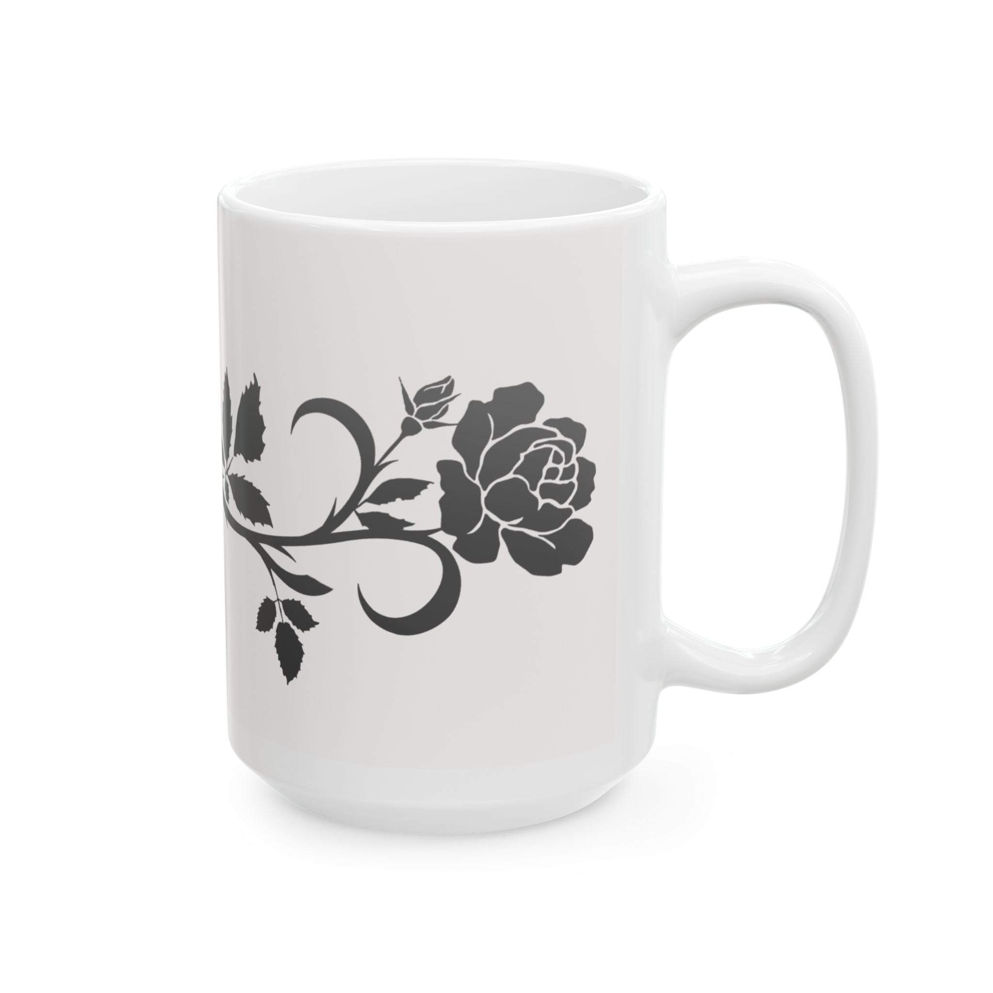 White mug with black rose design on a white background