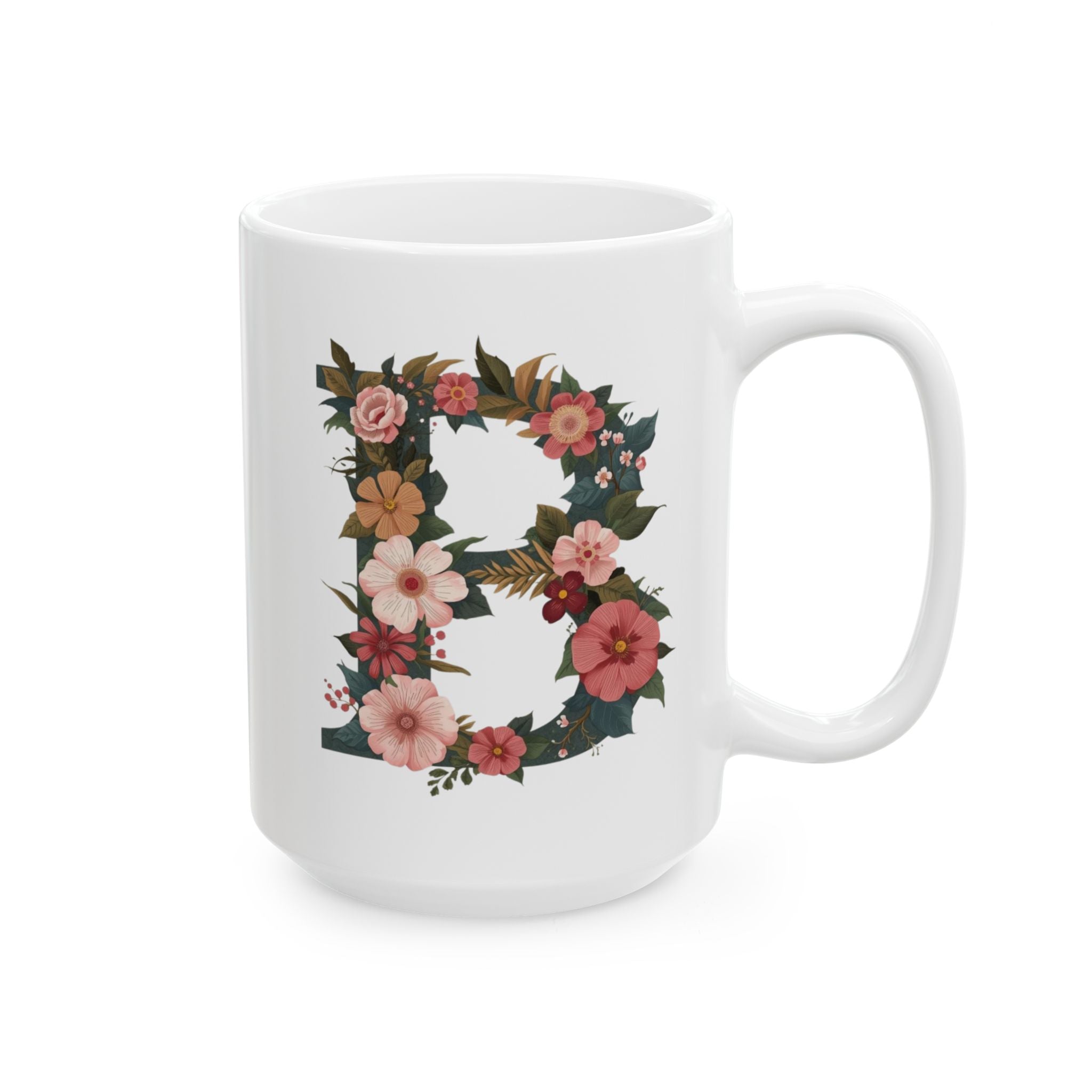 White mug with floral letter 'B' design on a white background