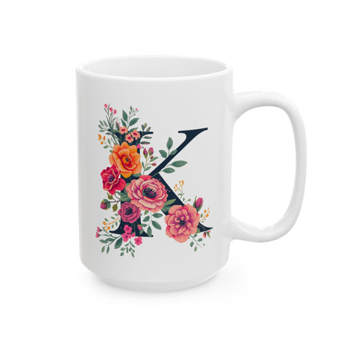 White mug with floral design and letter 'K' on a white background