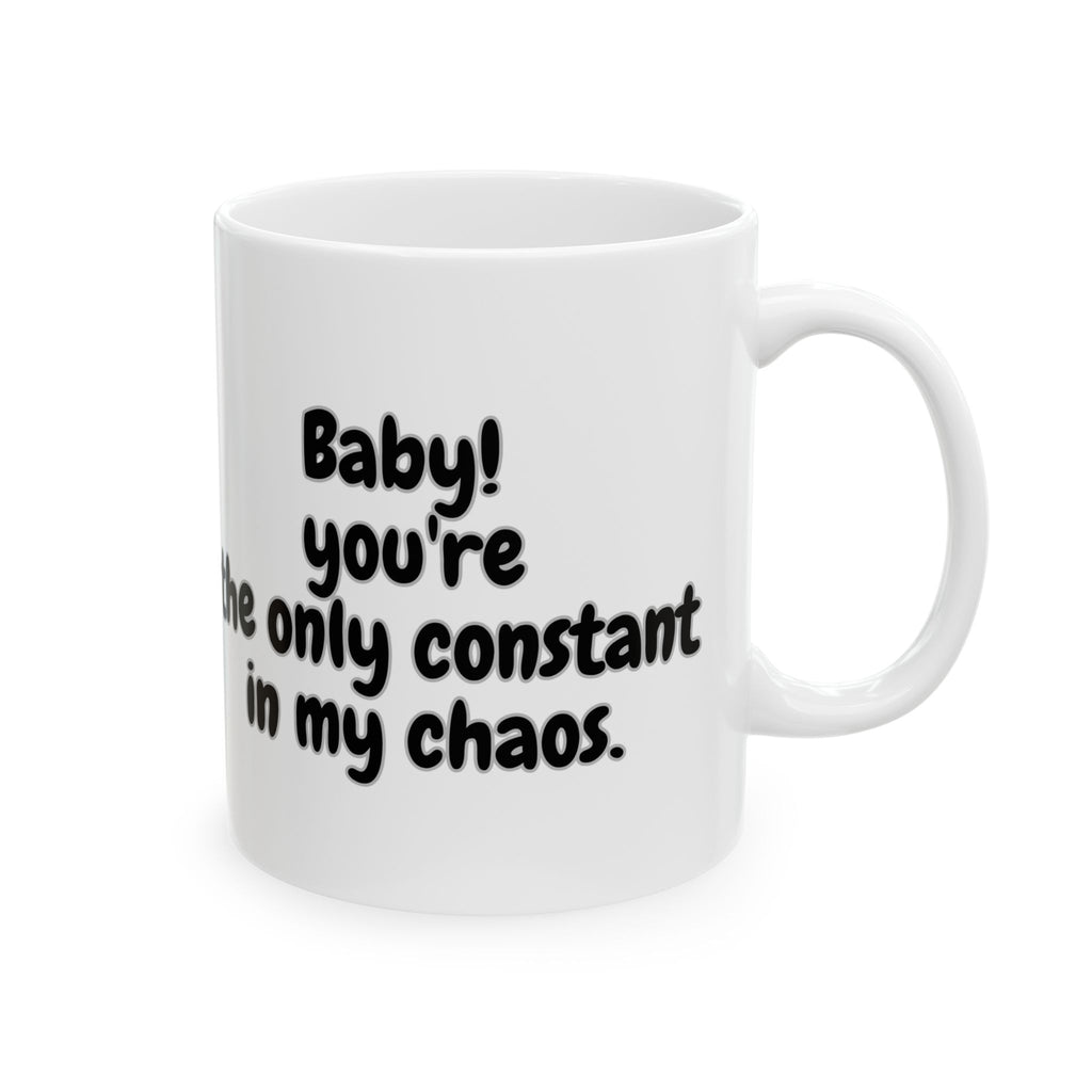 White mug with black text on a white background