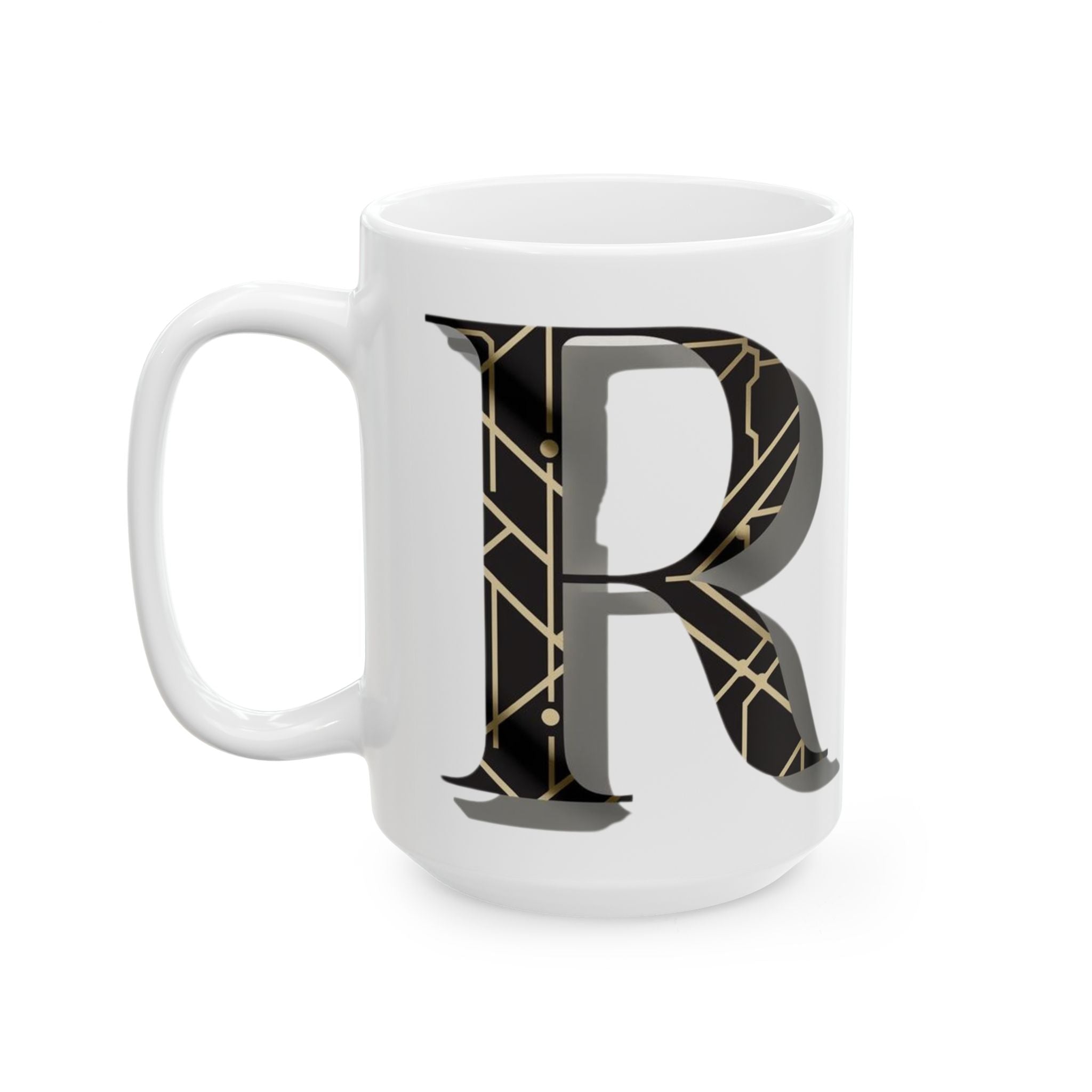 White mug with a black and gold letter 'R' design on a white background