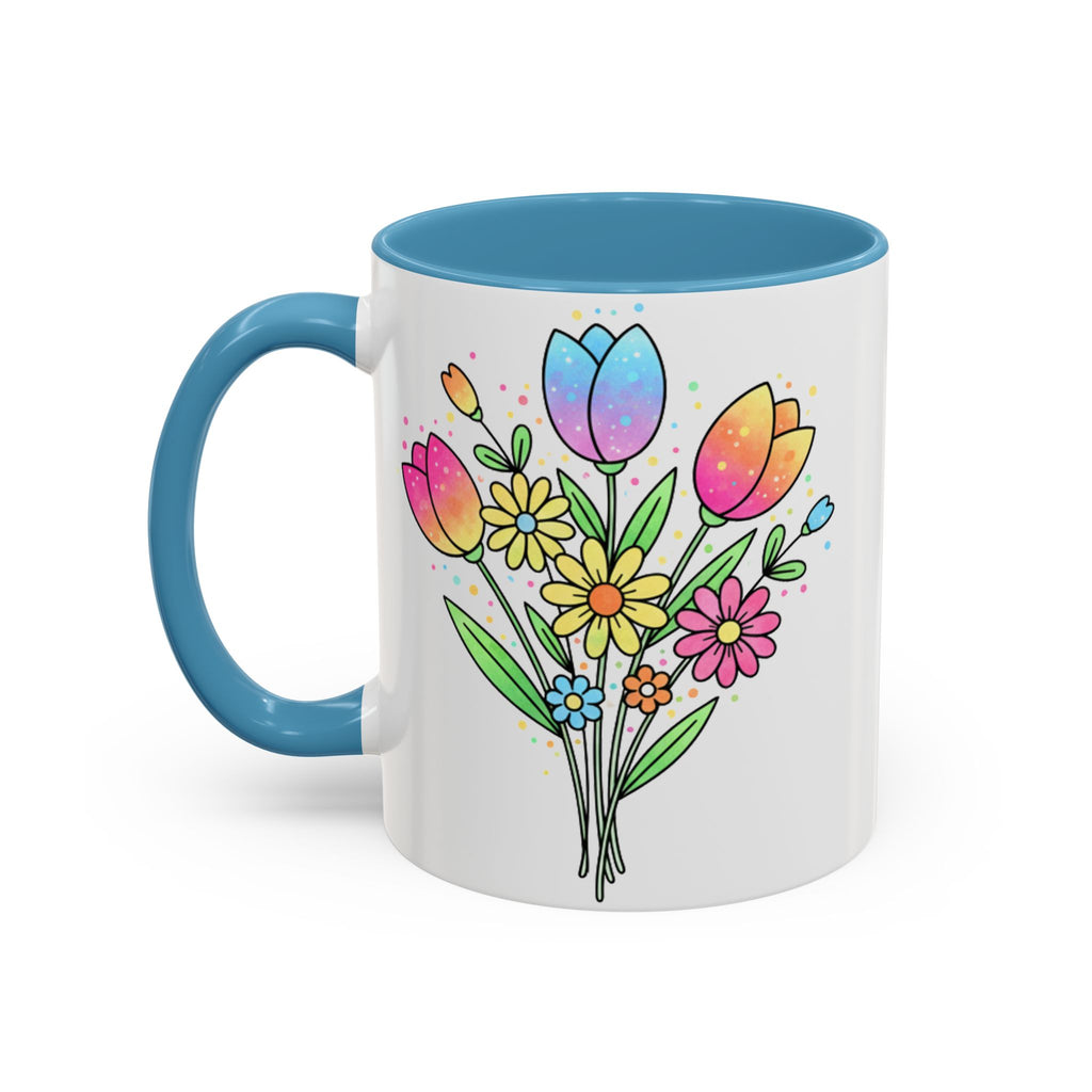 Mug with colorful floral design and blue handle on a white background