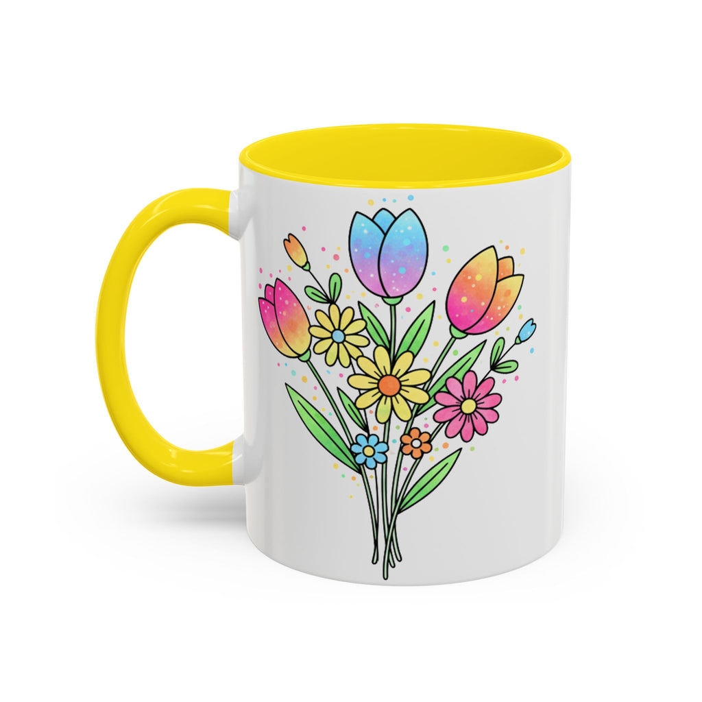 Mug with colorful floral design and yellow handle on a white background
