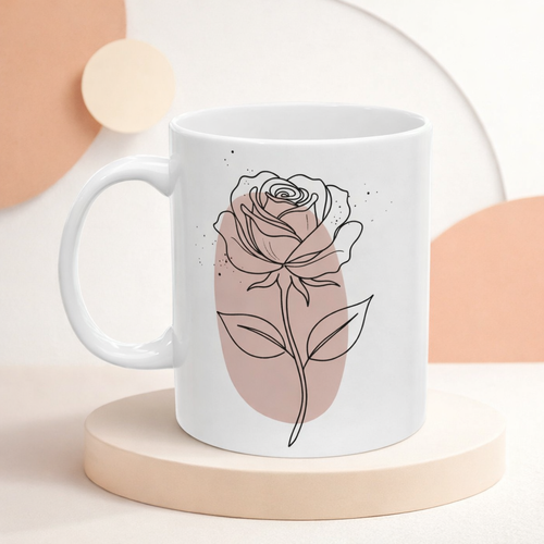 White mug with a pink rose design on a beige background