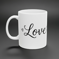 White mug with 'Love' text on a dark gray background
