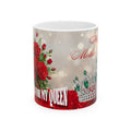 Mug with floral design, text, and tiara on a white background