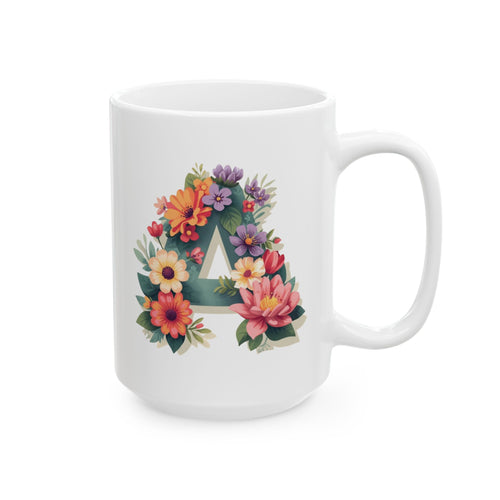 White mug with floral design and letter 'A' on a white background