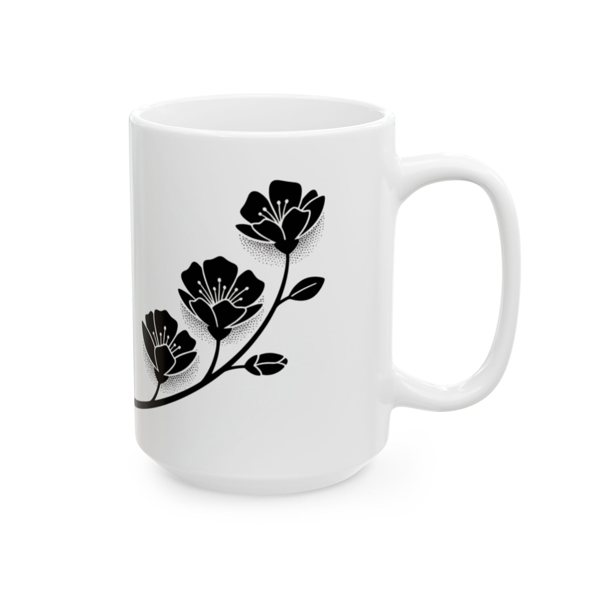 White mug with black floral design on a white background