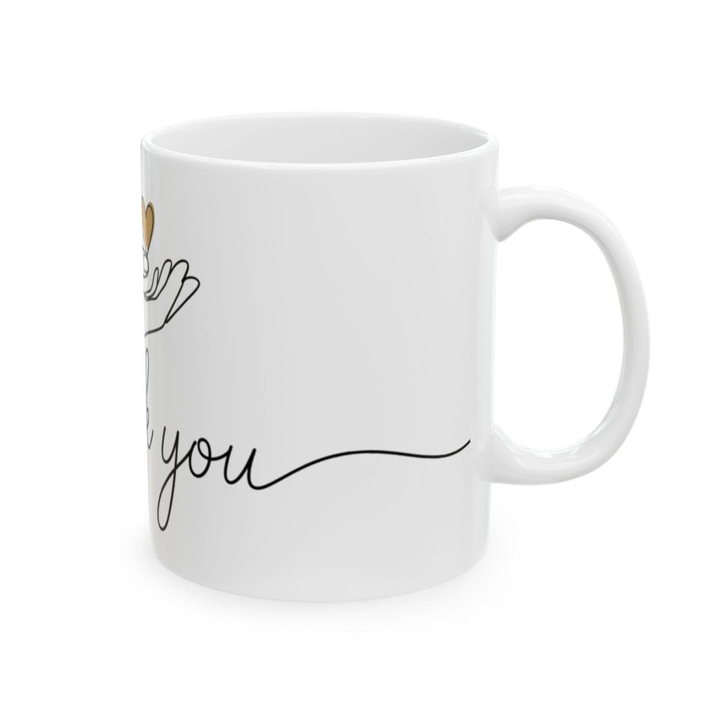 White mug on side with 'Thank you' text on a white background